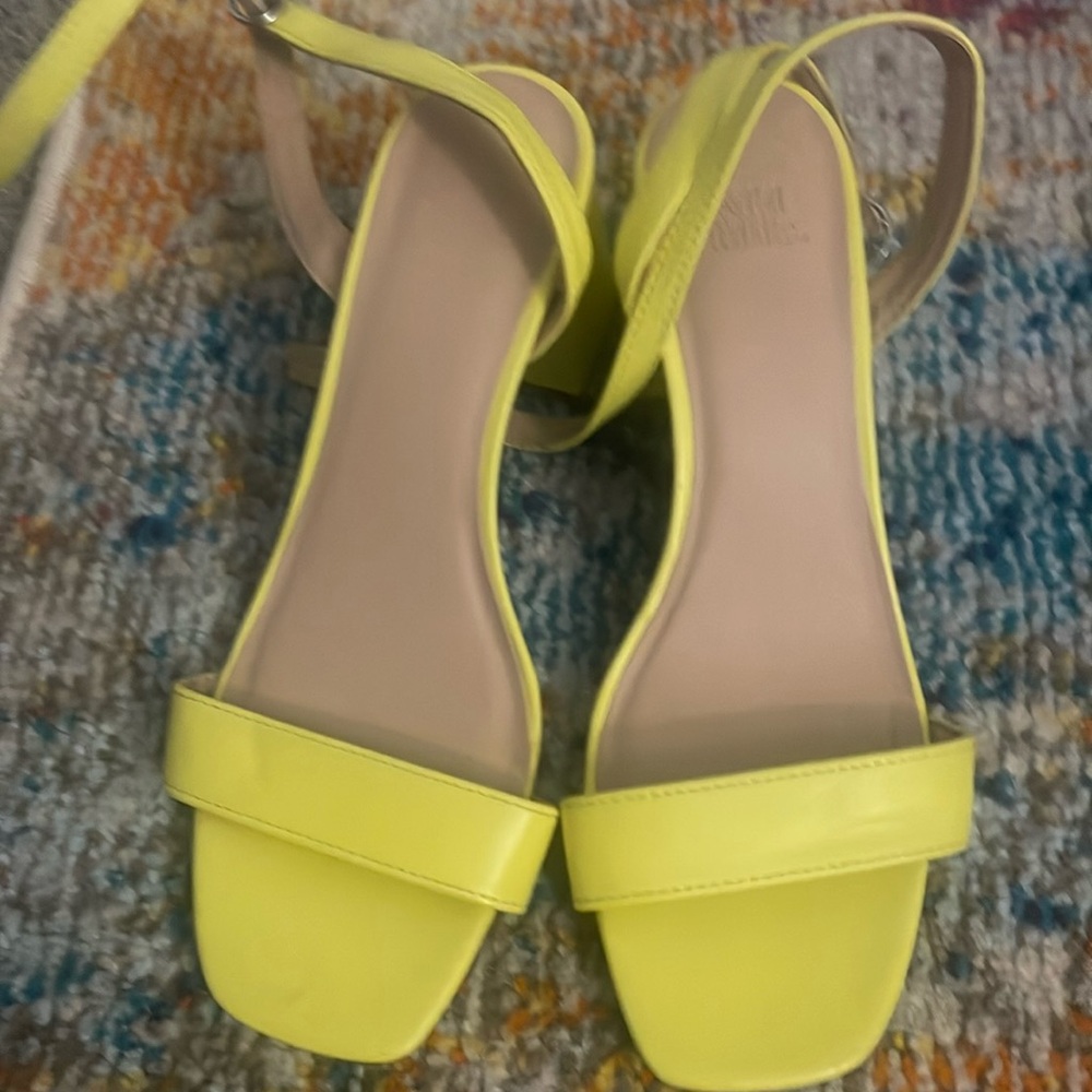 Yellow heels with medium heel. Perfect condition only worn once.
